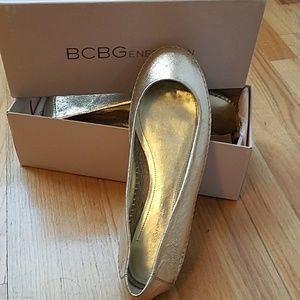 BCBG  BRAND NEW gold slip on shoe espadrilles